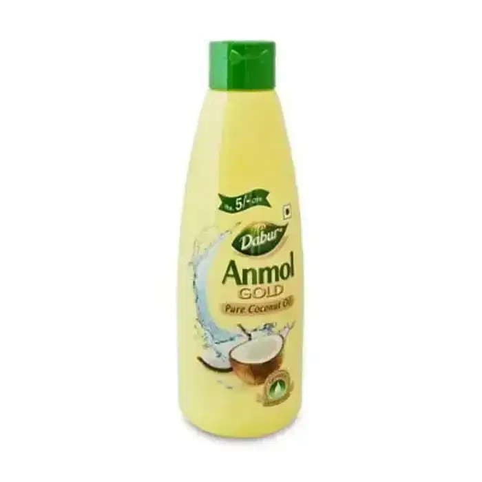 Dabur Anmol Gold 100% Pure Coconut Oil, 90ml bottle. Nourishing coconut oil for hair and skin.