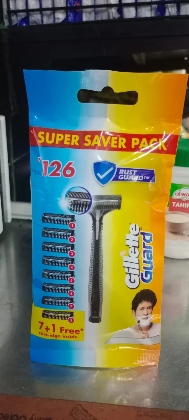 Gillette Guard Shaving Razor for Men with 1 razor and 8 blades.