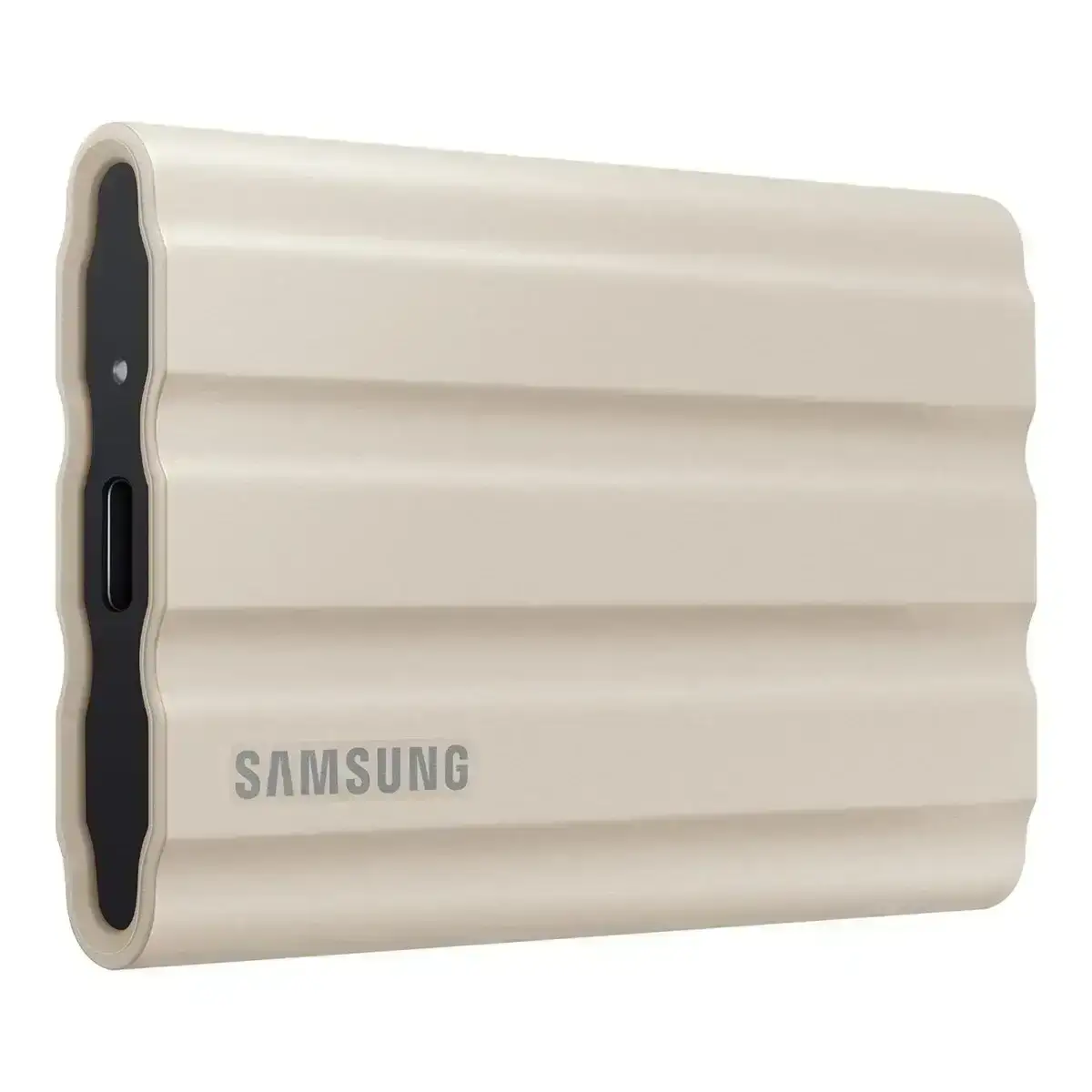 Samsung T7 Shield 1TB portable SSD. Beige, rugged, USB 3.2, up to 1050MB/s. Water and dust resistant external solid state drive.